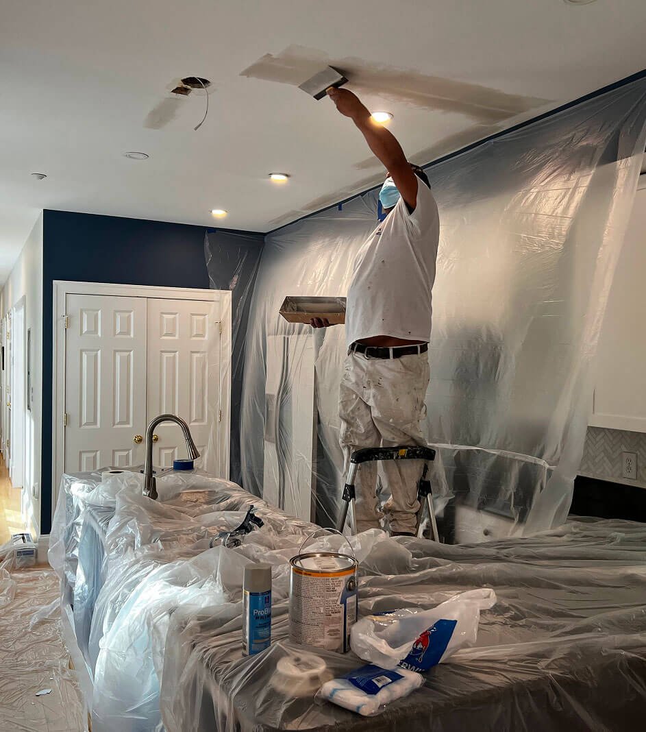 Fulton Contractor painting ceiling