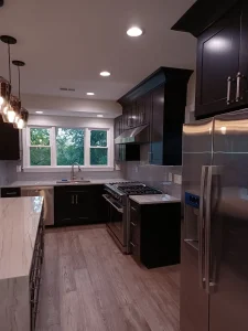 Dark kitchen remodel with quartz counters