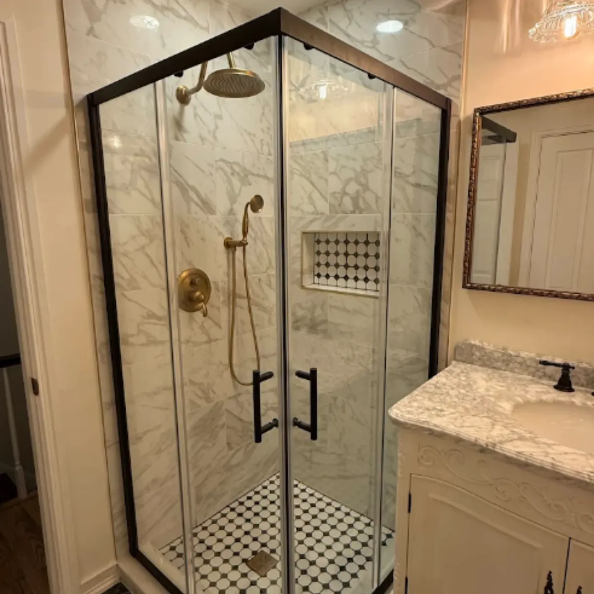 Corner glass shower enclosure with new countertop, Columbia MD bathroom remodel