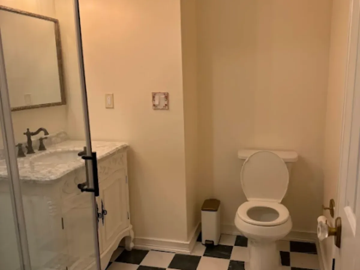 New toilet and vanity sink connected after a bathroom plumbing job in Arnold MD