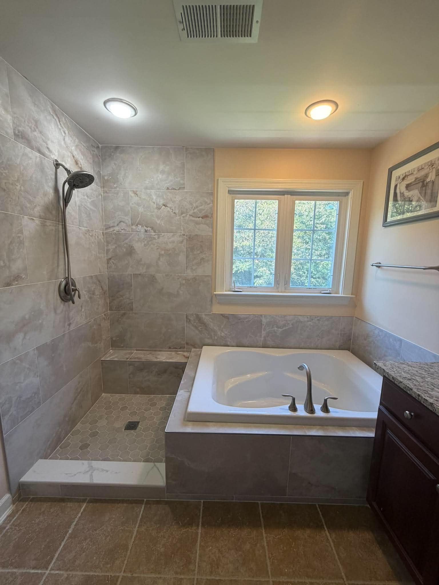 Bathroom remodel in Pasadena MD with tile walk-in shower and soaking tub