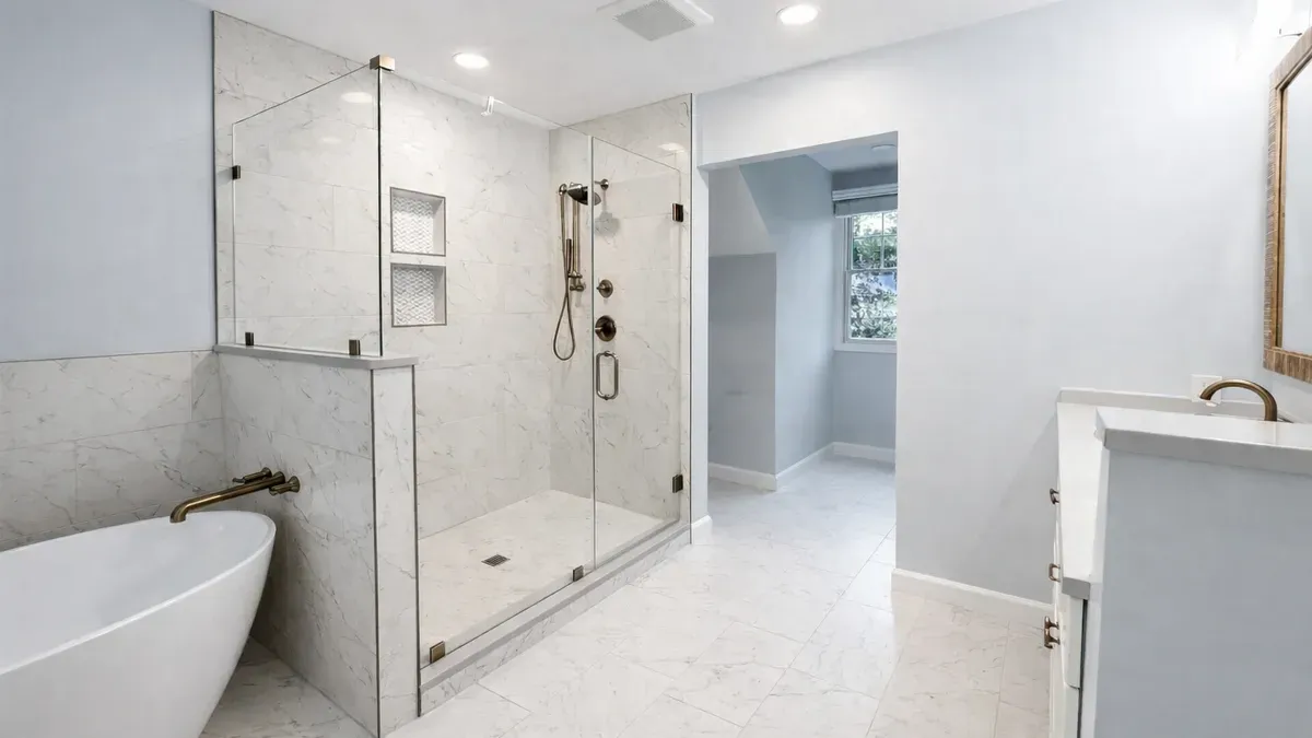 Curbless style glass shower with a low threshold entry in a remodeled Columbia MD bathroom